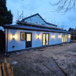 Rendering damp UK home walls to prevent moisture and damage