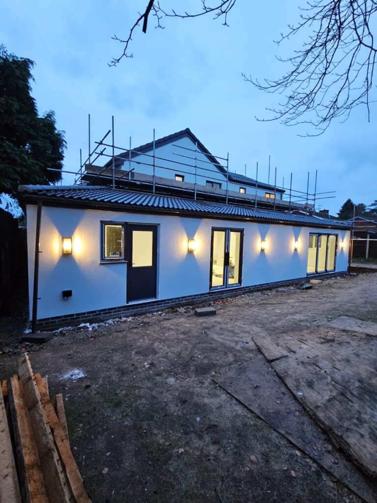 Rendering damp UK home walls to prevent moisture and damage